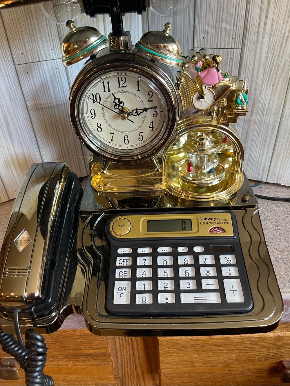 Vintage 80s phone, clock with moving pieces, carousel and calculator